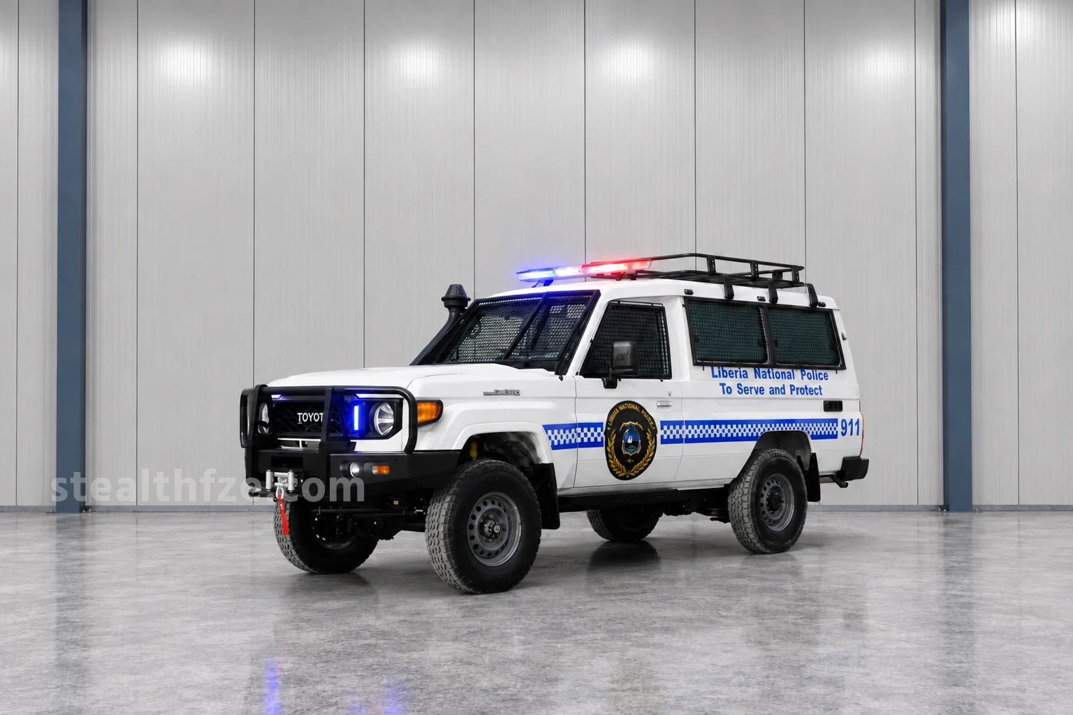 Toyota Land Cruiser 78 4x4 police vehicle with window guards, roof rack and front winch