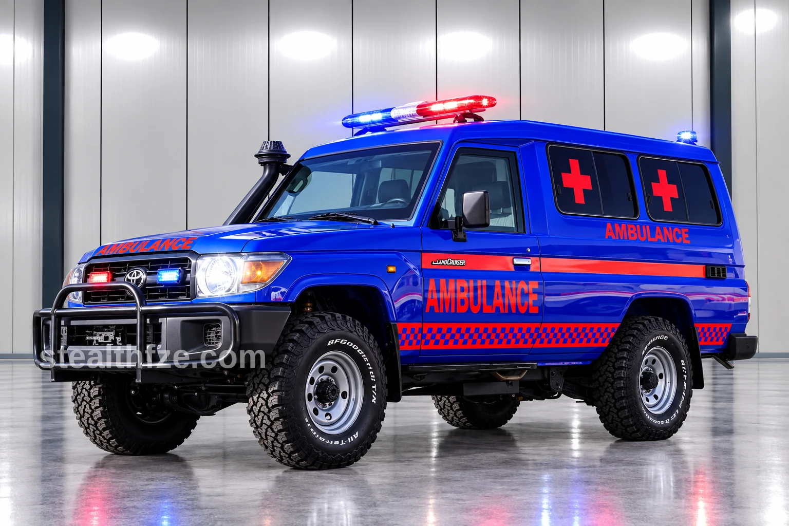 Blue Toyota Land Cruiser 78 4x4 ambulance with all-terrain tyres and roof light bar